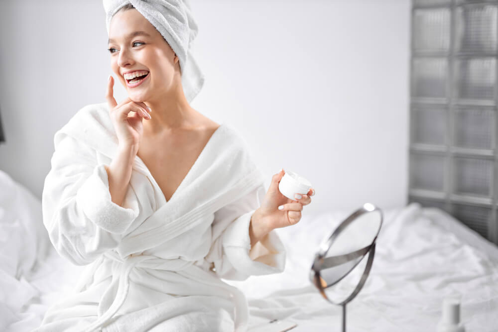 Woman following daily skincare routine