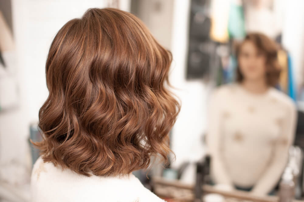 Woman with curly bob