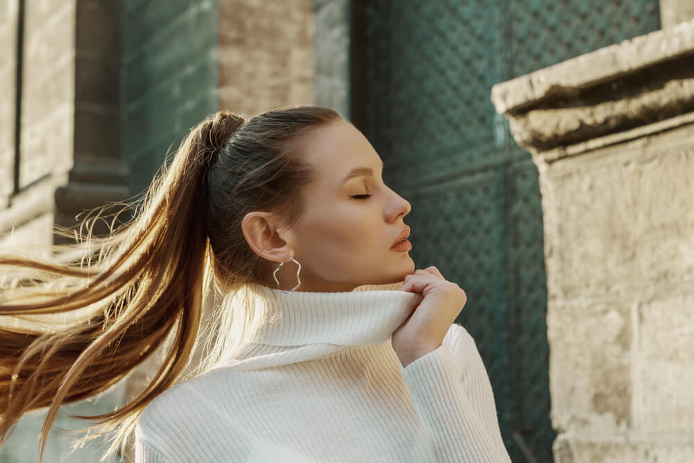 Woman with high ponytail