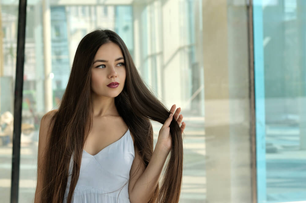 Woman with straight thick hair