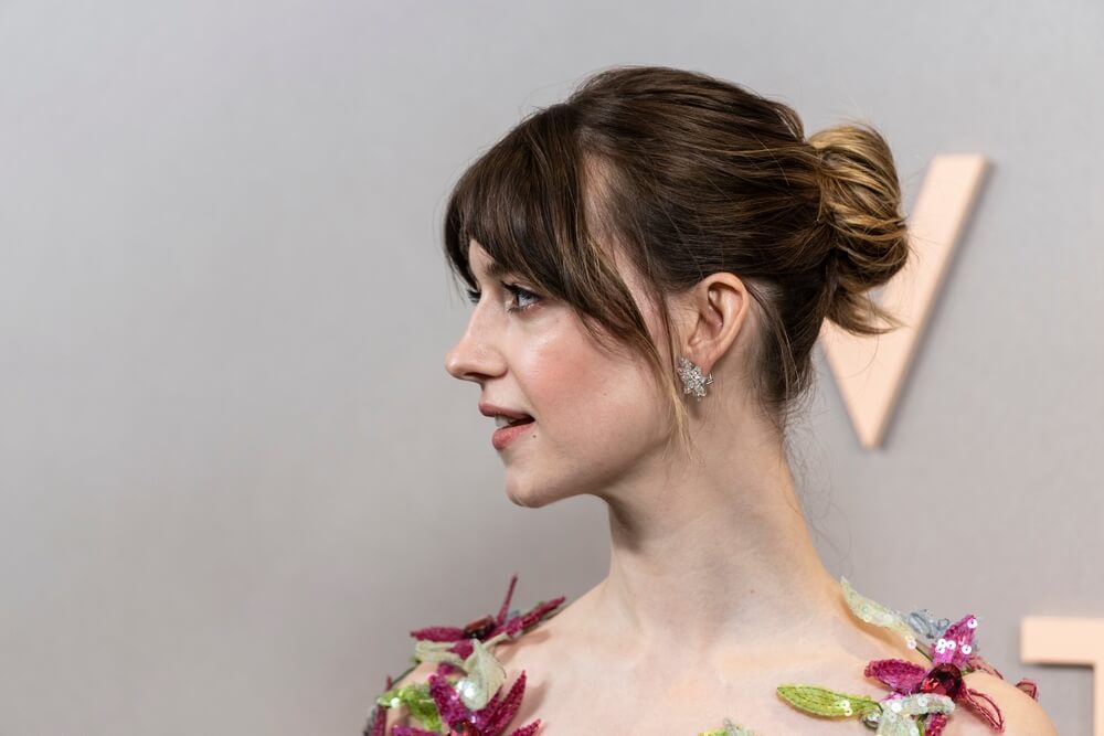 Curtain bangs and chignon