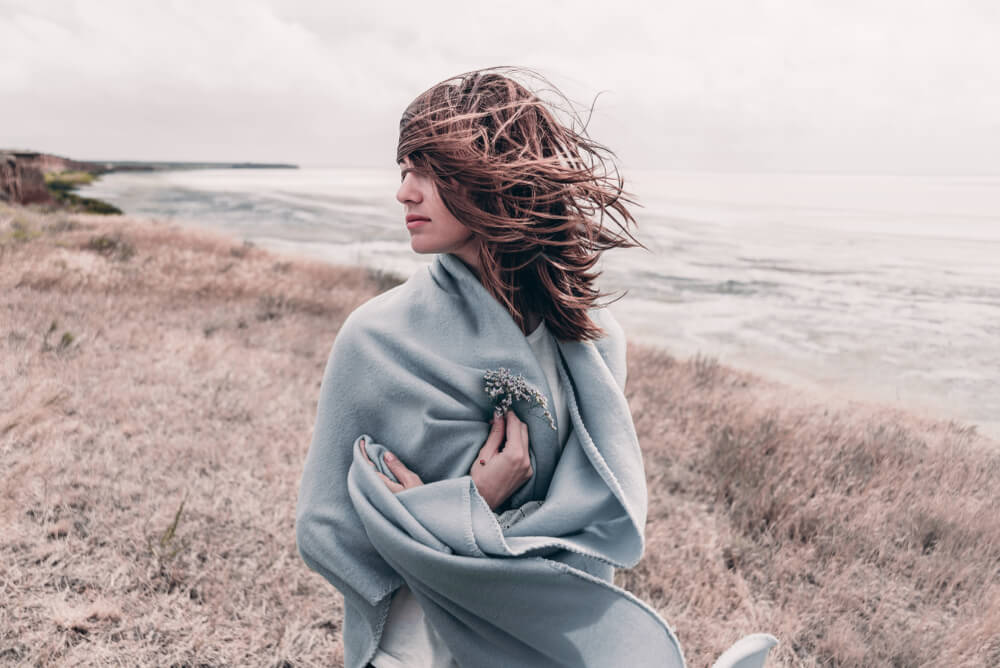 Wind blowing woman's hair outdoors